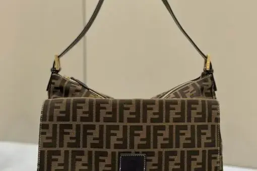 Fendi Baguette Bag Brown FF Jacquard – luxury handbag with signature FF canvas, gold buckle, and adjustable strap.