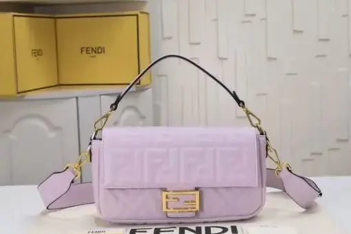 Fendi Baguette Bag Light Pink in embossed leather with FF logo – luxury designer handbag with gold hardware.