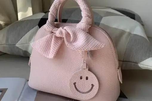 Hermes Handbag Pink Bow – Exclusive Luxury Leather Bag with Elegant Bow Detail.