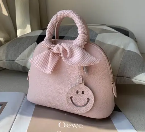 Hermes Handle Bag Pink Bow 2026 | Drip Kickz Hermes Handbag Pink Bow – Exclusive Luxury Leather Bag with Elegant Bow Detail.