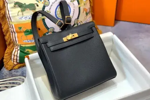Hermes Kelly Ado Backpack Black in Togo leather with gold hardware – a luxury backpack inspired by the iconic Hermes Kelly Bag.