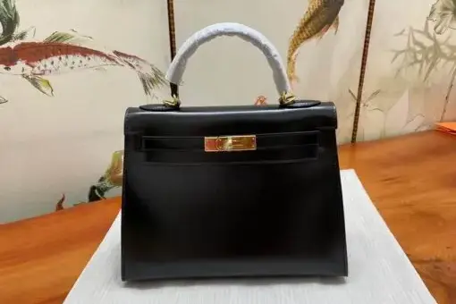 Hermes Kelly Sellier 28cm Black in calfskin leather with gold hardware – luxury Hermès handbag with structured Sellier design.