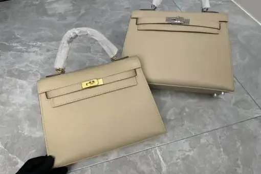 Hermes Kelly Sellier 25cm Black Off-White in Epsom leather with gold hardware – luxury Hermès handbag with structured Sellier design.