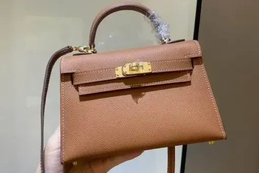 Hermes Kelly Mini Pochette Beige in premium leather with gold hardware – luxury mini bag inspired by the iconic Hermes Kelly Bag.