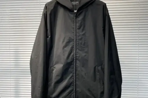 Balenciaga Hooded Windbreaker Jacket Black front view – black hooded water-resistant jacket with Balenciaga logo, luxury minimalist streetwear