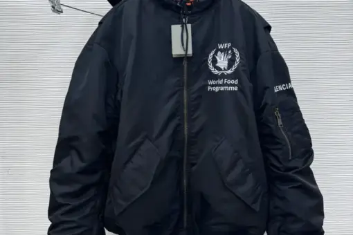 Balenciaga WFP Bomber Jacket Black front view – black nylon bomber with Balenciaga and World Food Programme logos, luxury streetwear design