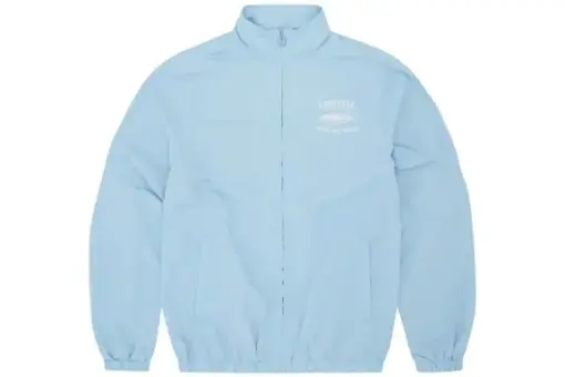 Corteiz Track Jacket Baby Blue front view – pastel blue nylon jacket with Corteiz logo, lightweight streetwear design