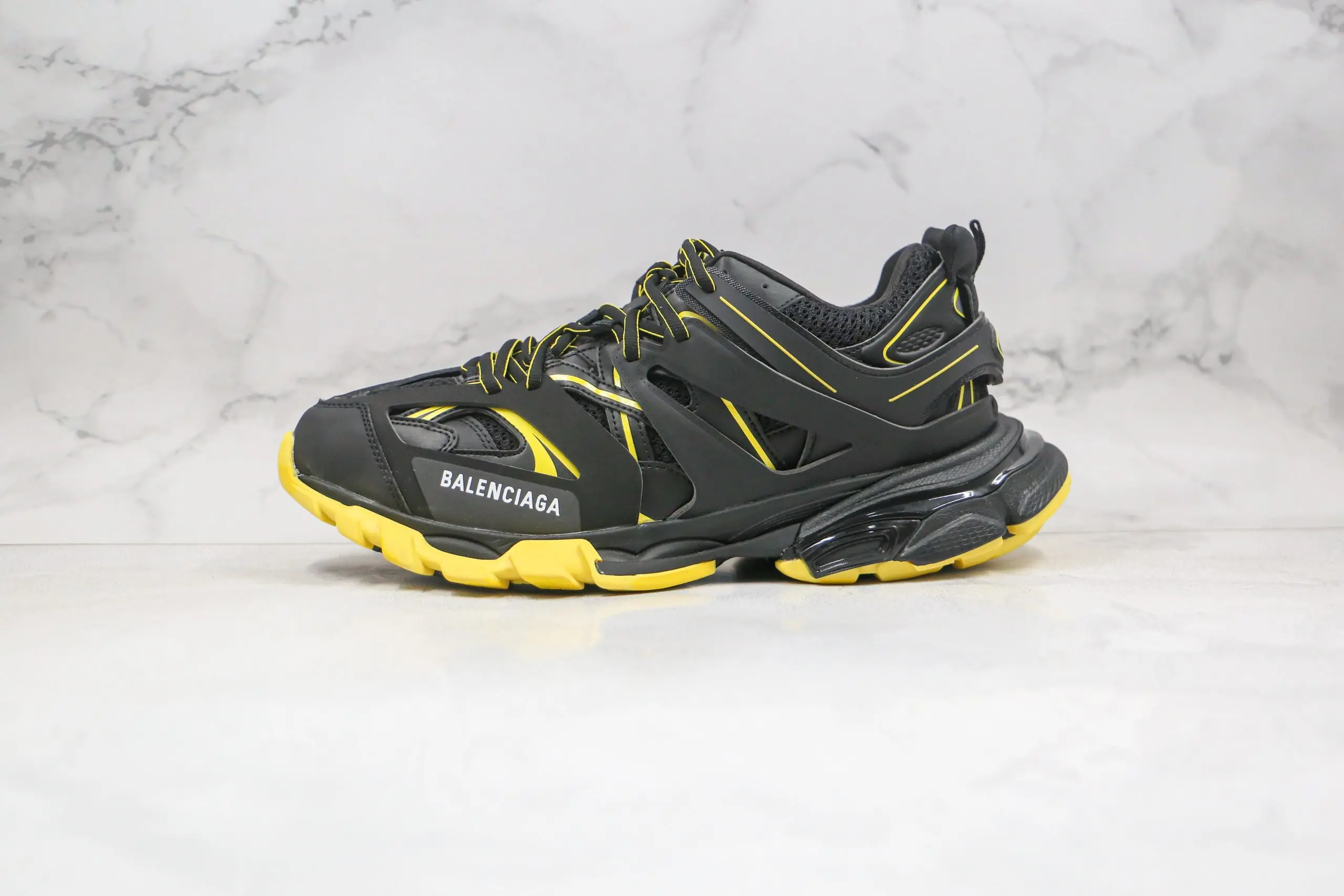 BALENCIAGA Track Mule Clear Sole Sneakers Black Yellow 2026 | Drip Kickz BALENCIAGA Track Mule Clear Sole Sneakers Black Yellow
