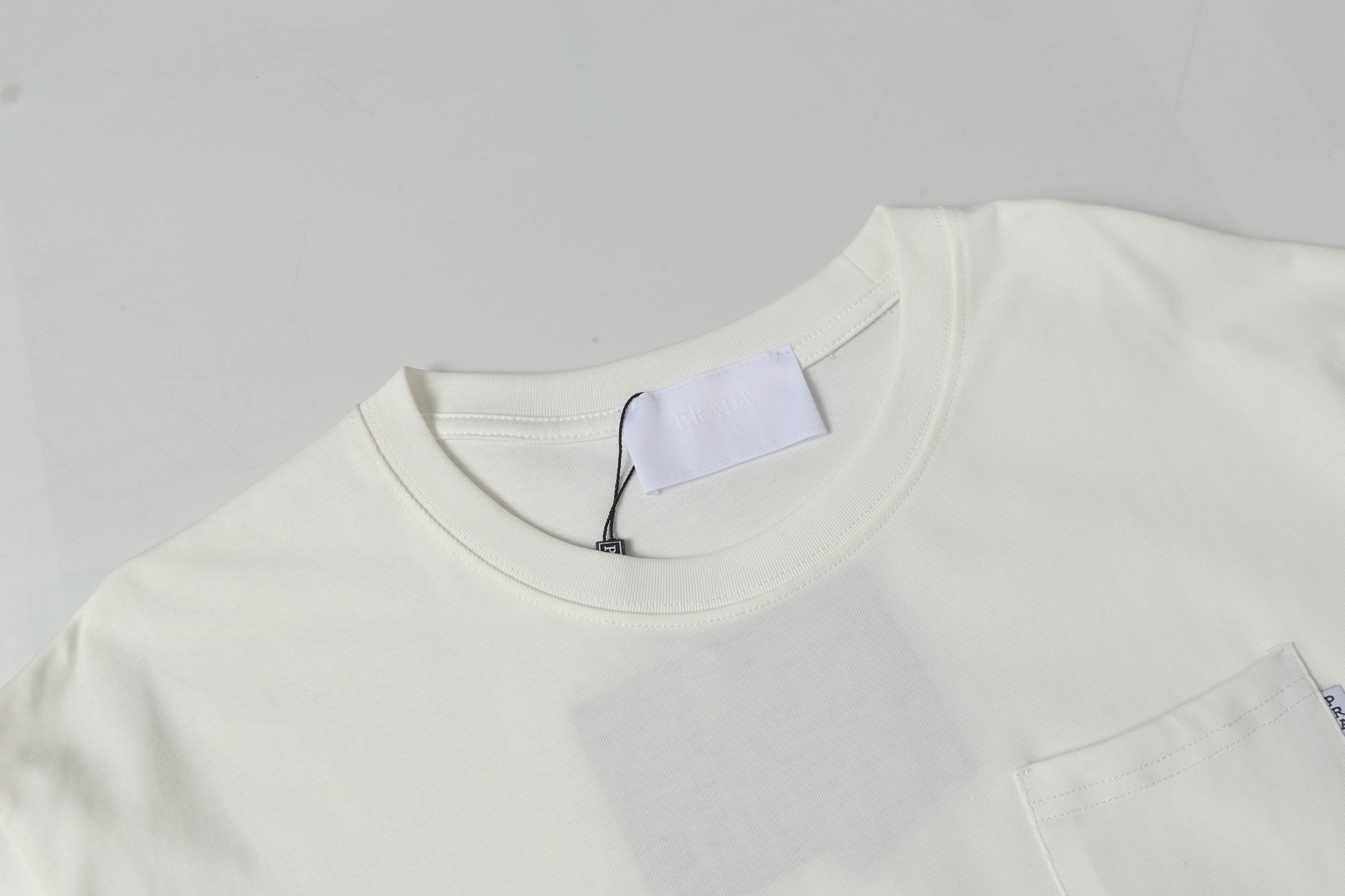 Prada Patch Pocket T-Shirt White 2026 | Drip Kickz Prada Patch Pocket T-Shirt White - Image 3