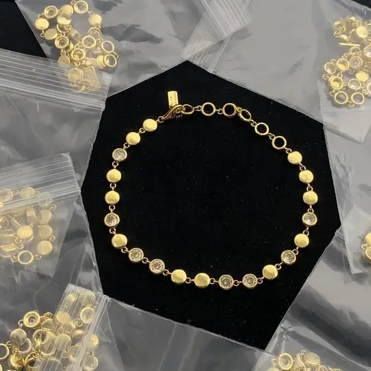 Gold-Tone Station Bracelet Alternating Solid Discs & Bezel-Set Crystals 2026 | Drip Kickz Gold-Tone Station Bracelet Alternating Solid Discs & Bezel-Set Crystals