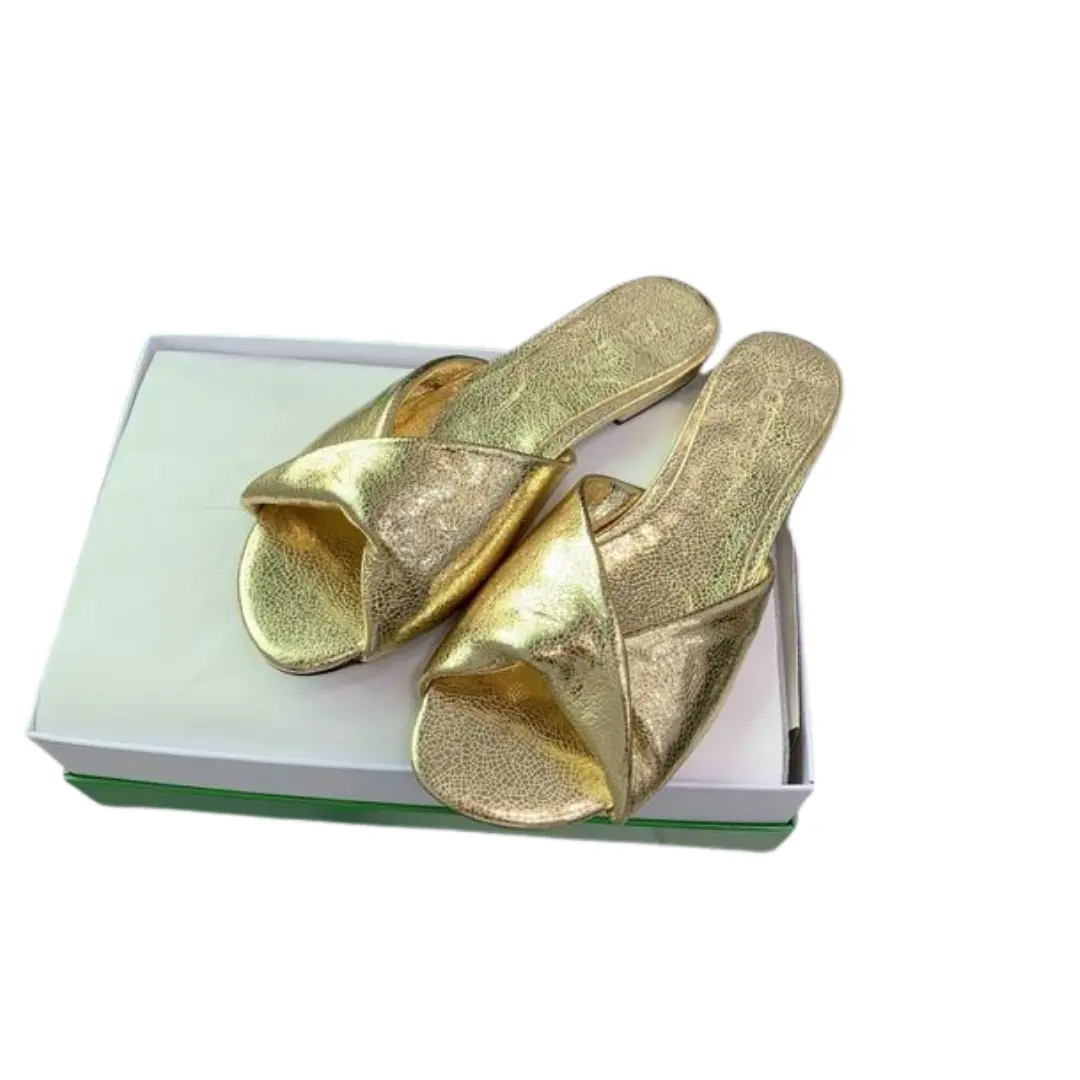 Bottega Veneta Blink Intrecciato Leather Flat Mules Glossy Gold 2026 | Drip Kickz Bottega Veneta Blink Intrecciato Leather Flat Mules Glossy Gold