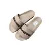 Balenciaga Logo Embossed Pool Slides Beige Rubber