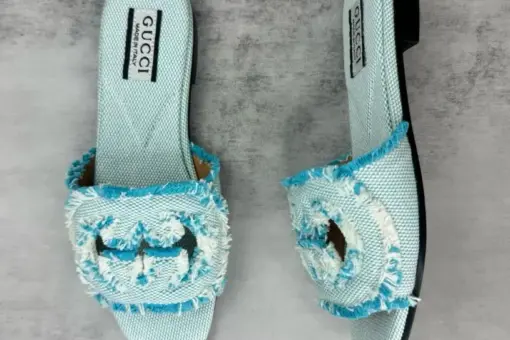 Interlocking G cutout suede slides light blue